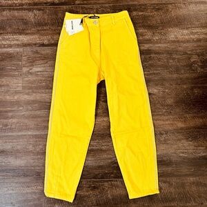 Nocturne women’s yellow pants studded sides